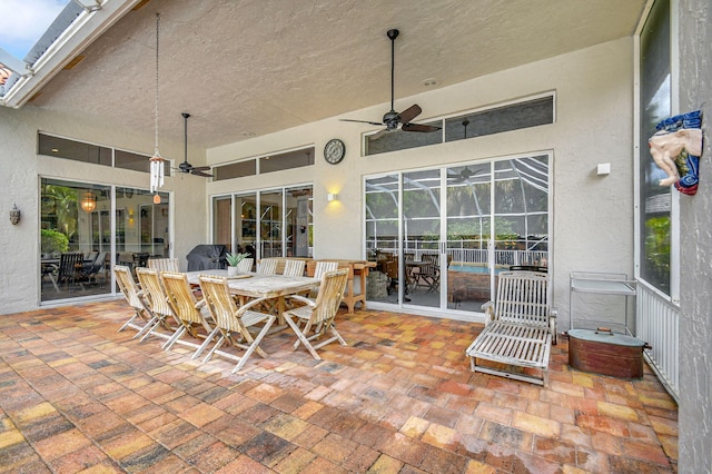 view of patio featuring ceiling fan