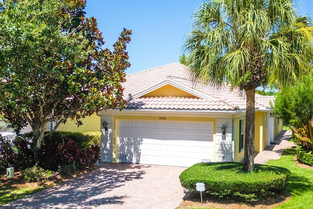 view of front of property featuring a garage