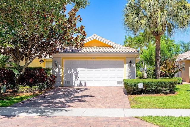 view of front of house with a garage