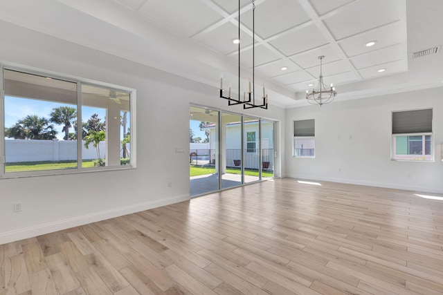 unfurnished dining area featuring visible vents, coffered ceiling, baseboards, light wood-style flooring, and recessed lighting