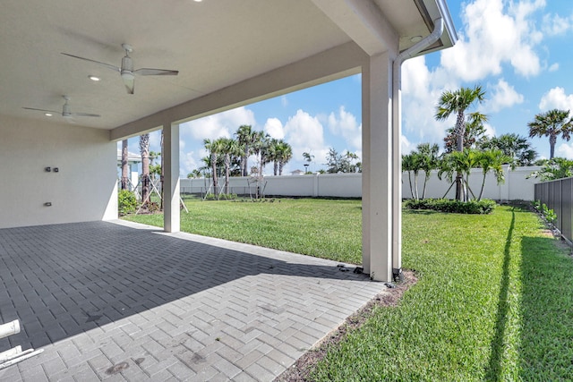 view of patio featuring ceiling fan and a fenced backyard