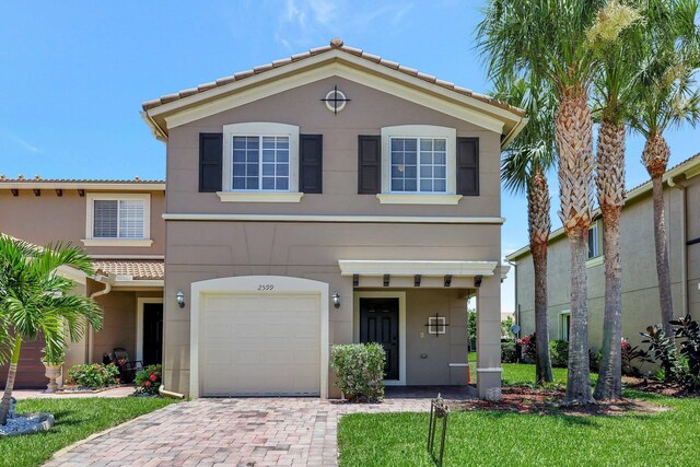 view of front of house with a garage