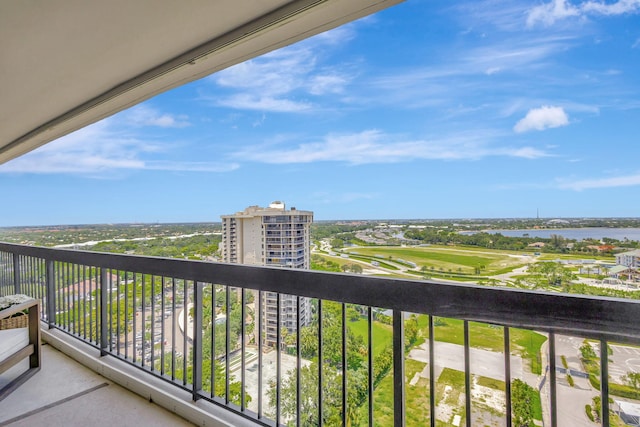 balcony featuring a water view