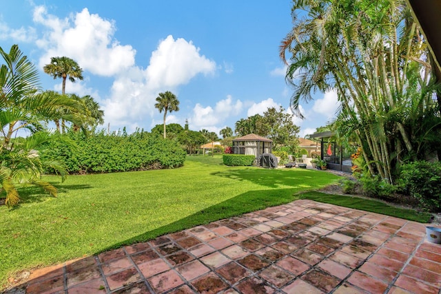 view of yard with a patio area