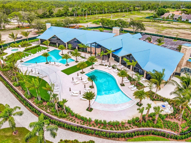 view of swimming pool with a patio