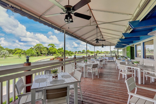 wooden deck with ceiling fan