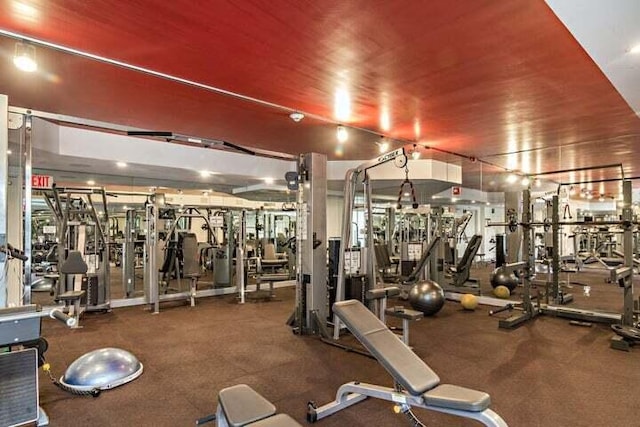 workout area with wooden ceiling