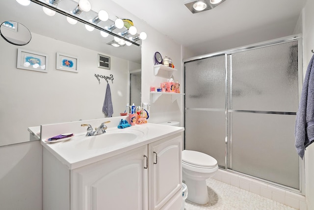 full bathroom with toilet, tile patterned flooring, vanity, and a shower stall