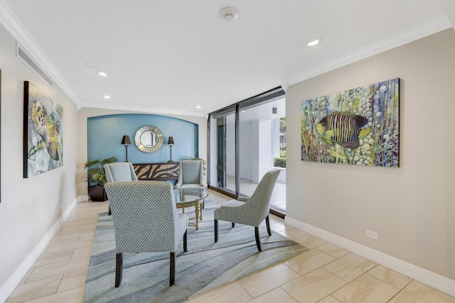 dining space featuring ornamental molding and a wall of windows