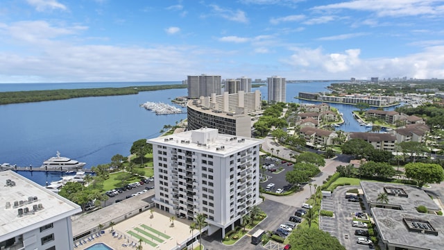 birds eye view of property featuring a water view