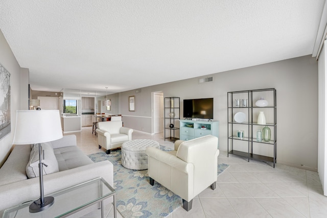 living room featuring a textured ceiling