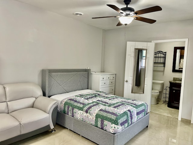 bedroom with ensuite bath and ceiling fan