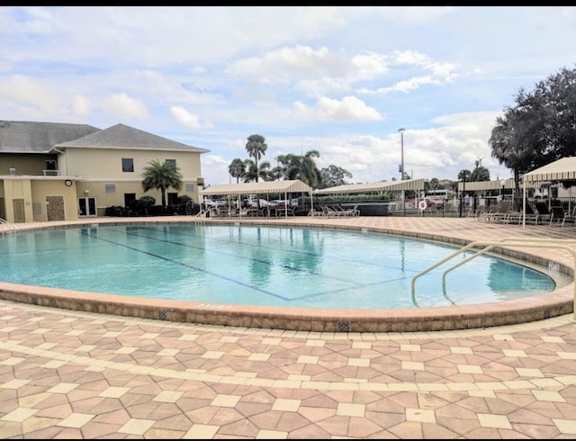 view of swimming pool featuring a patio