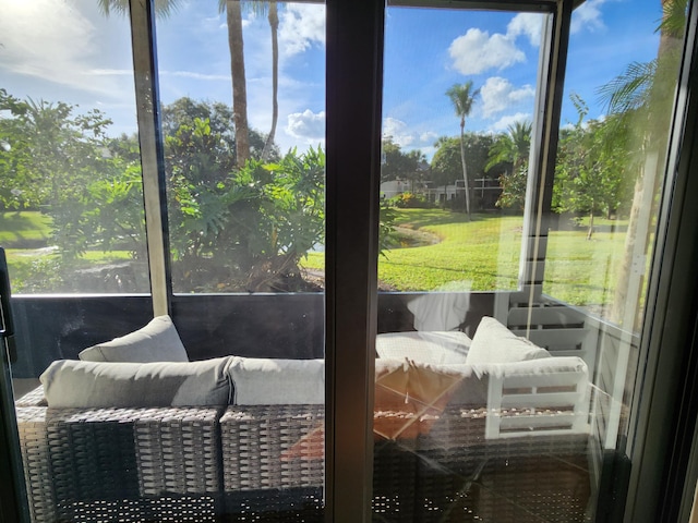 sunroom featuring a healthy amount of sunlight