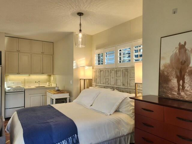 bedroom featuring sink