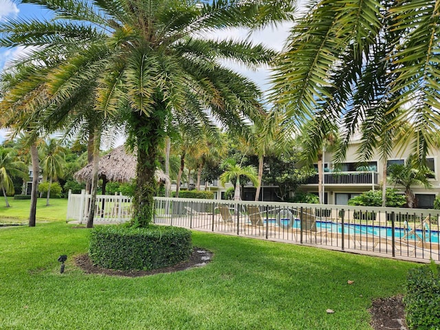 view of yard with a community pool