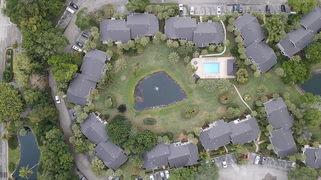 11863 Wimbledon Cir Unit 416, Wellington, FL 33414 - aerial view of property and surrounding area with nearby suburban area and a large body of water