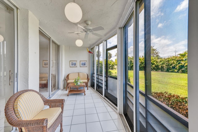 sunroom / solarium with ceiling fan