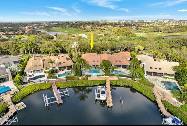 drone / aerial view with a water view