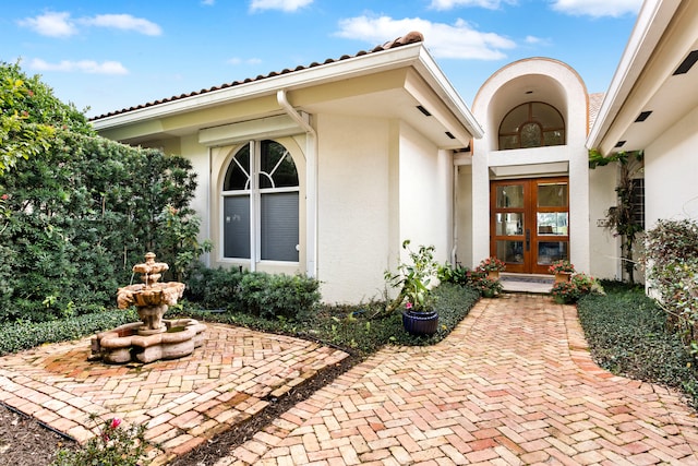 doorway to property with french doors