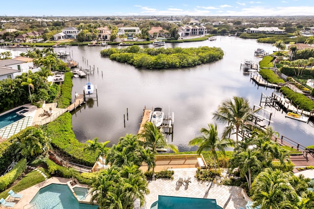 bird's eye view with a water view