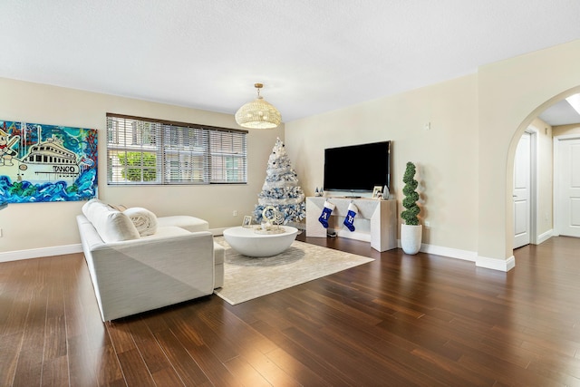 living room featuring dark hardwood / wood-style floors