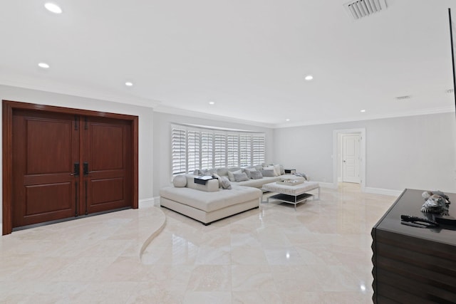 living room with ornamental molding