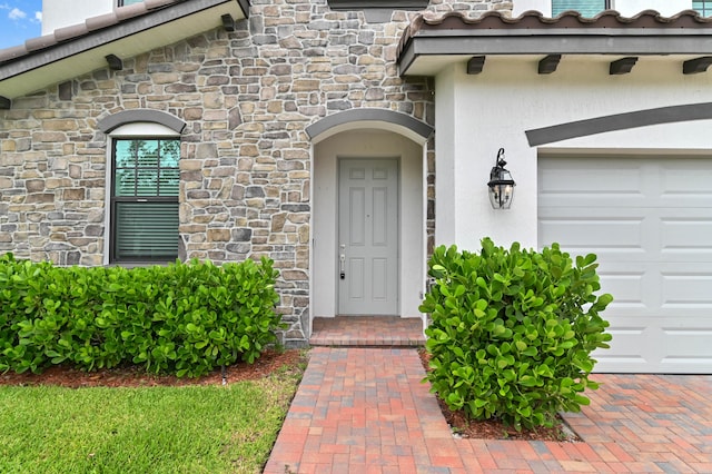 entrance to property with a garage