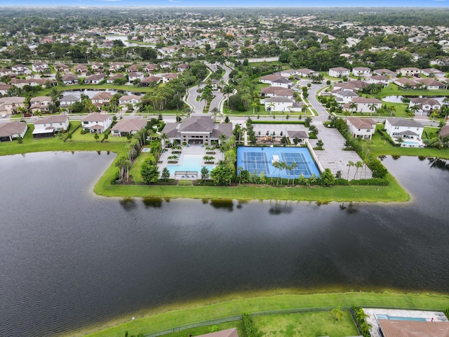 drone / aerial view with a water view