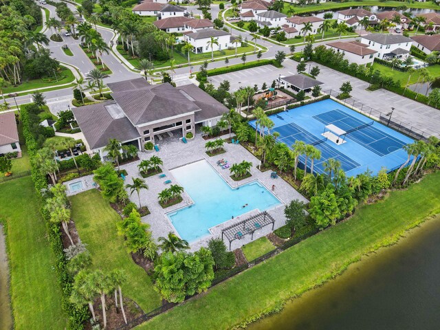 birds eye view of property featuring a water view