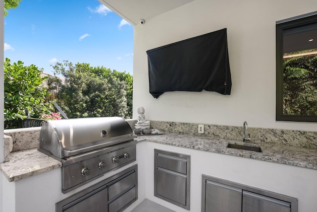 view of patio / terrace featuring area for grilling, grilling area, and sink