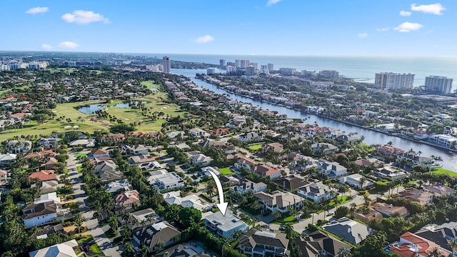 drone / aerial view with a water view