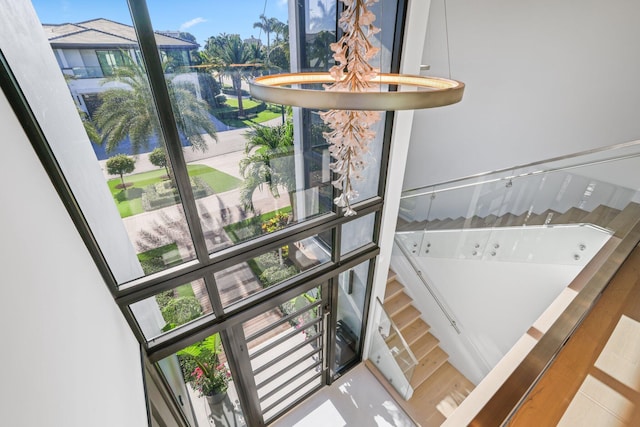 stairway featuring wood-type flooring