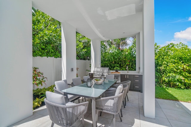 view of patio with sink and grilling area