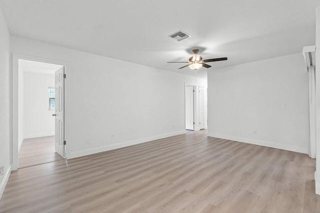 unfurnished room featuring light hardwood / wood-style flooring and ceiling fan