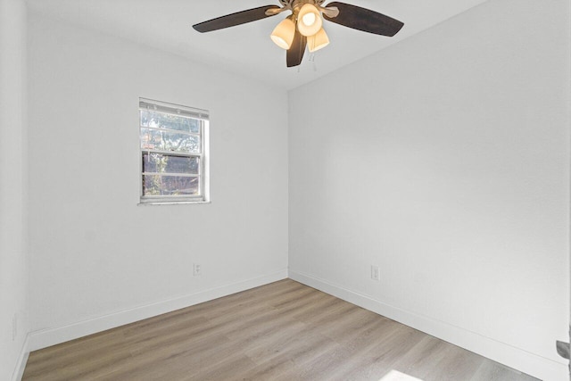 unfurnished room with ceiling fan and light hardwood / wood-style floors