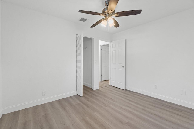 unfurnished bedroom featuring ceiling fan and light hardwood / wood-style flooring