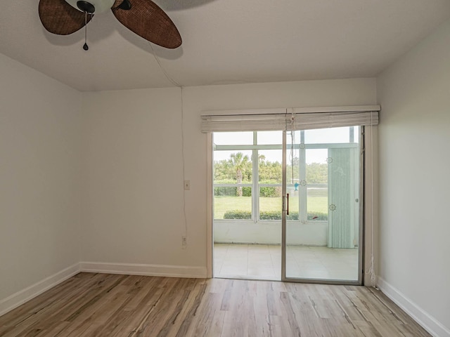 entryway with ceiling fan, light hardwood / wood-style floors, and plenty of natural light