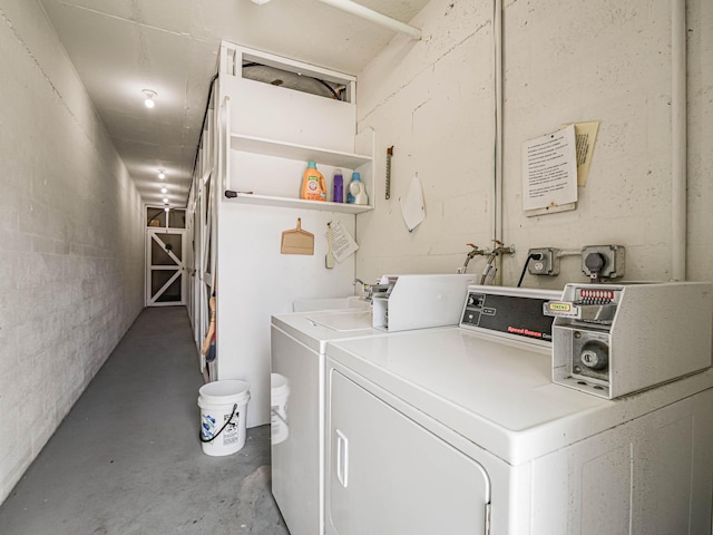 washroom with washer and dryer