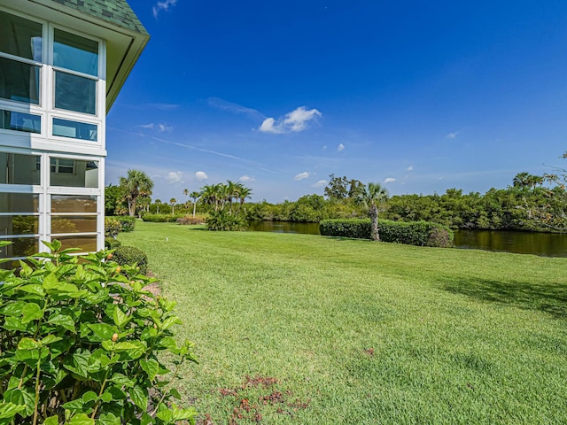 view of yard with a water view