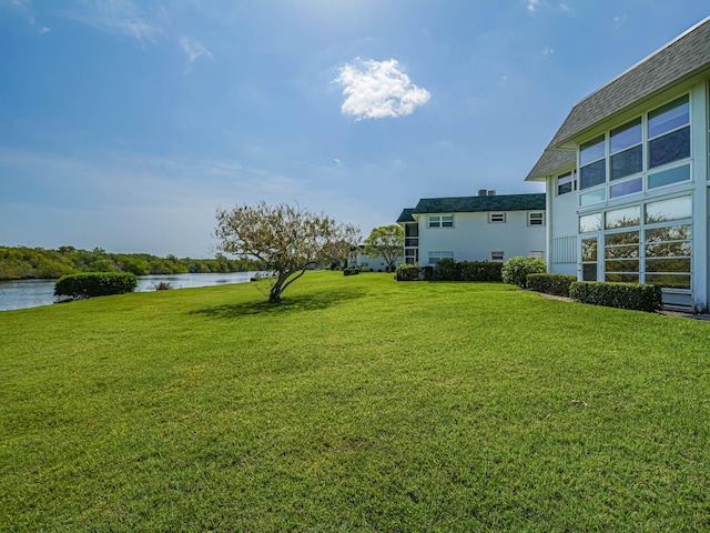 view of yard featuring a water view