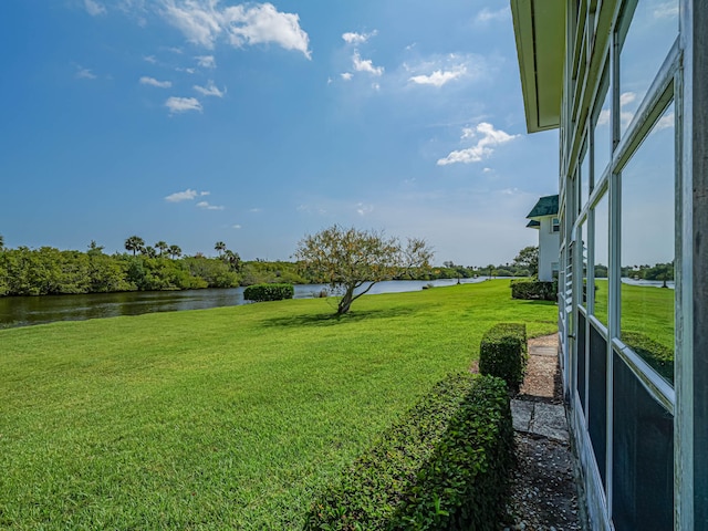 view of yard with a water view