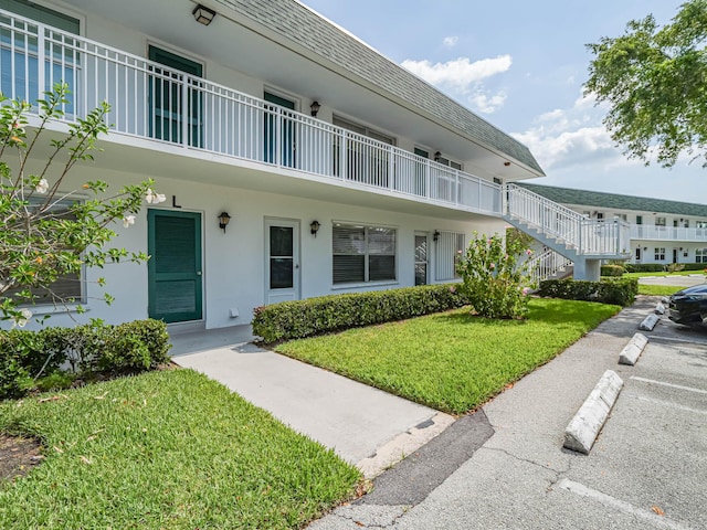 exterior space with a front lawn