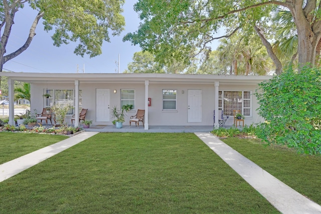 view of front of house featuring a front lawn and a porch