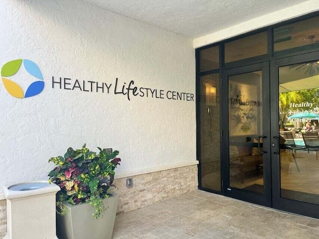 view of exterior entry with french doors