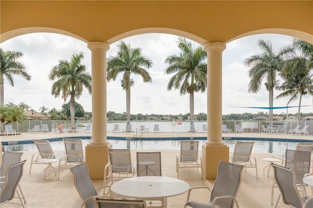 view of patio with a community pool