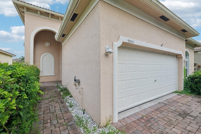 entrance to property with a garage