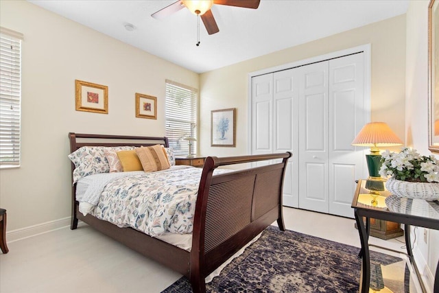 bedroom featuring ceiling fan and a closet