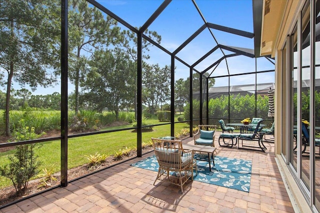 sunroom / solarium featuring plenty of natural light