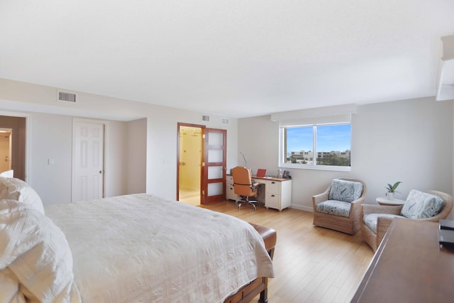 bedroom featuring light hardwood / wood-style flooring